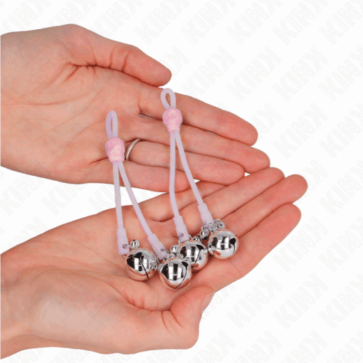 KINK - PINZAS PARA PEZONES LUMINOSAS FORMA CALABERA CON CASCABEL SONORO AJUSTABLE ROSA / PLATEADO - Imagen 3