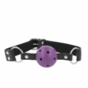 Comprar KINK - MORDAZA DE BOLA 4 CM TRANSPIRABLE CON DOBLE REMACHE MORADO 62 x 2.5 CM AJUSTABLE 42-58 CM al mejor precio - Envíos Discretos