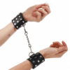 Comprar KINK - MUÑEQUERAS CON CIERRE A PRESIÓN LLENO DE TACHUELAS AJUSTABLE NEGRO 19-24 CM X 5.5 CM al mejor precio - Envíos Discretos