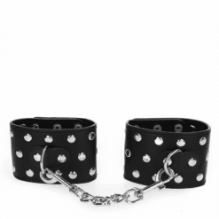 Comprar KINK - MUÑEQUERAS CON CIERRE A PRESIÓN LLENO DE TACHUELAS AJUSTABLE NEGRO 19-24 CM X 5.5 CM al mejor precio - Envíos Discretos