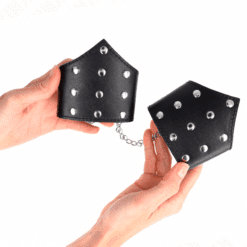 Comprar KINK - MUÑEQUERAS ESTILO PUNTIAGUDO NEGRO CON CADENA AJUSTABLE 17-23 CM X 8.5 CM al mejor precio - Envíos Discretos