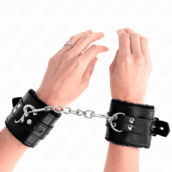 Comprar KINK - MUÑEQUERAS FORRADAS CON AGUJEROS CUADRADOS NEGRO Y CORREA NEGRO AJUSTABLE 17-29 CM X 6 CM al mejor precio - Envíos Discretos
