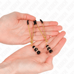 Comprar KINK - PINZAS PARA PEZONES DORADA FINA CON TRIPLE BOLA DE VIDRIO NEGRO 7 CM al mejor precio - Envíos Discretos